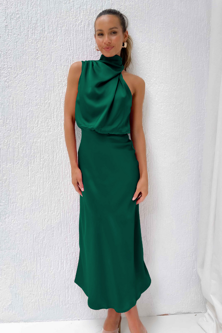 Vestito estivo midi donna, aderente, con scollo asimmetrico. Chic e alla moda.