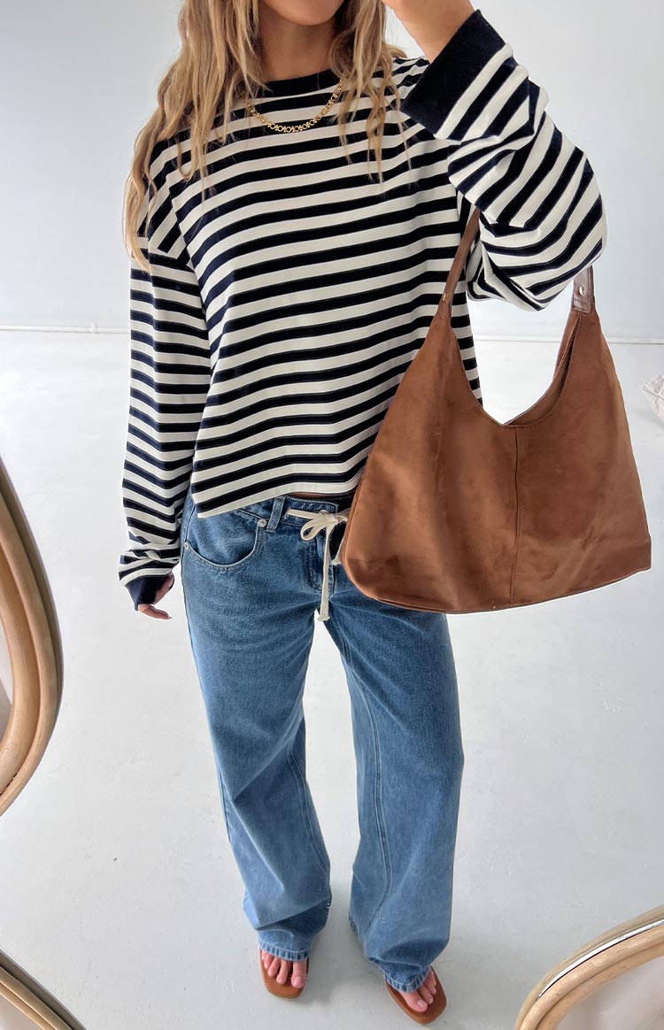 Maglia donna semplice e confortevole, maniche lunghe, righe blu navy. Vestibilità ampia per un tocco di moda casual.