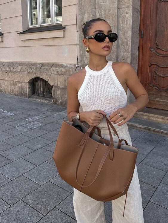 Borsa tote donna in pelle vintage, grande e versatile, accessorio moda quotidiano ed elegante.