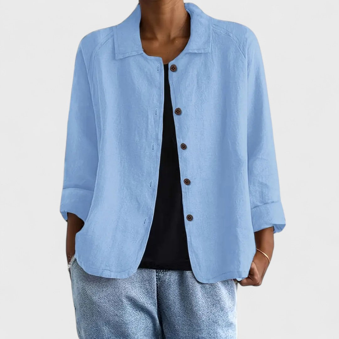 Top donna a maniche lunghe con bottoni, versatile e confortevole, ideale per primavera/estate.