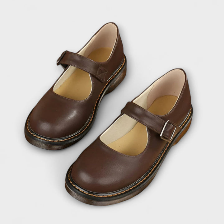 Scarpe donna vintage eleganti in pelle marrone con cinturino. Comfort e stile classico senza tempo.