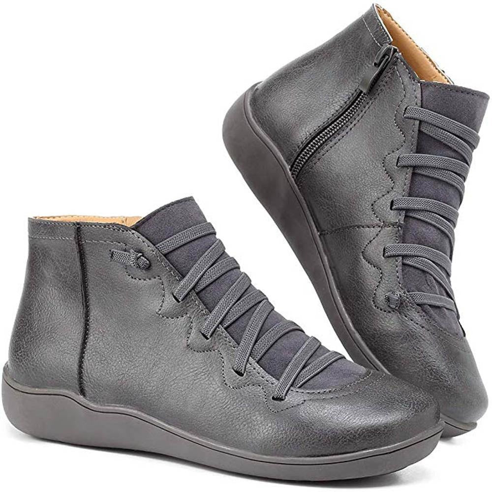 Dettaglio: stivaletti donna con lacci robusti e zip laterale, design moderno per autunno-inverno.