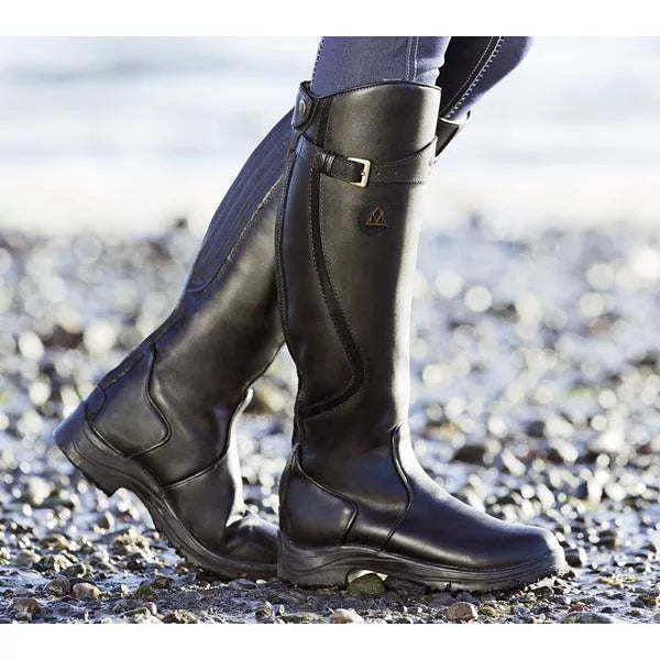 Eleganti stivali country donna a gambale alto con fibbia laterale, suola scolpita, perfetti per l'autunno.
