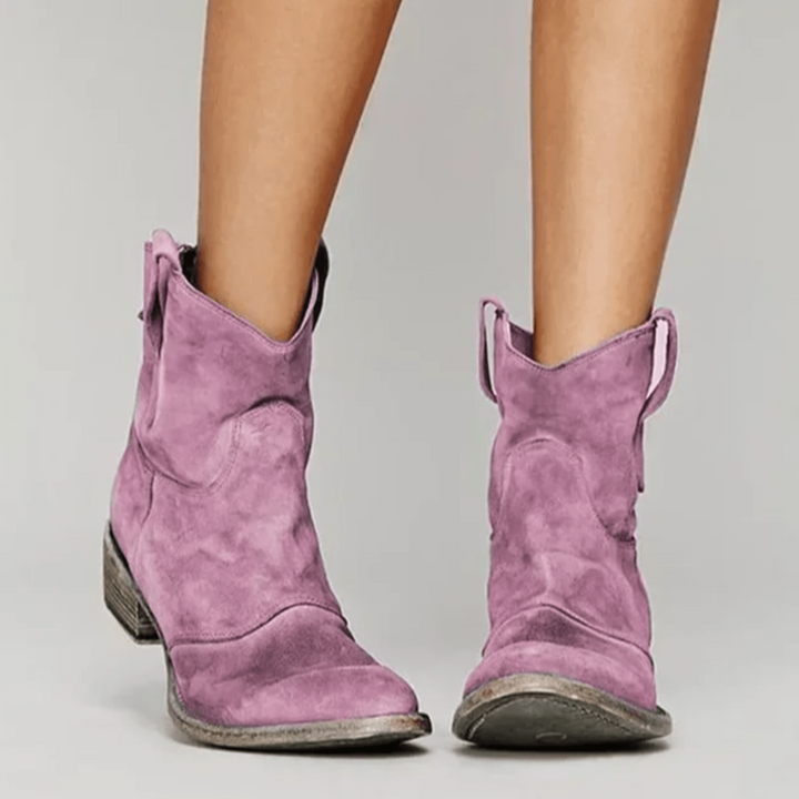 Stivali donna stile western, tacco basso, comodi e versatili per outfit casual o più eleganti.