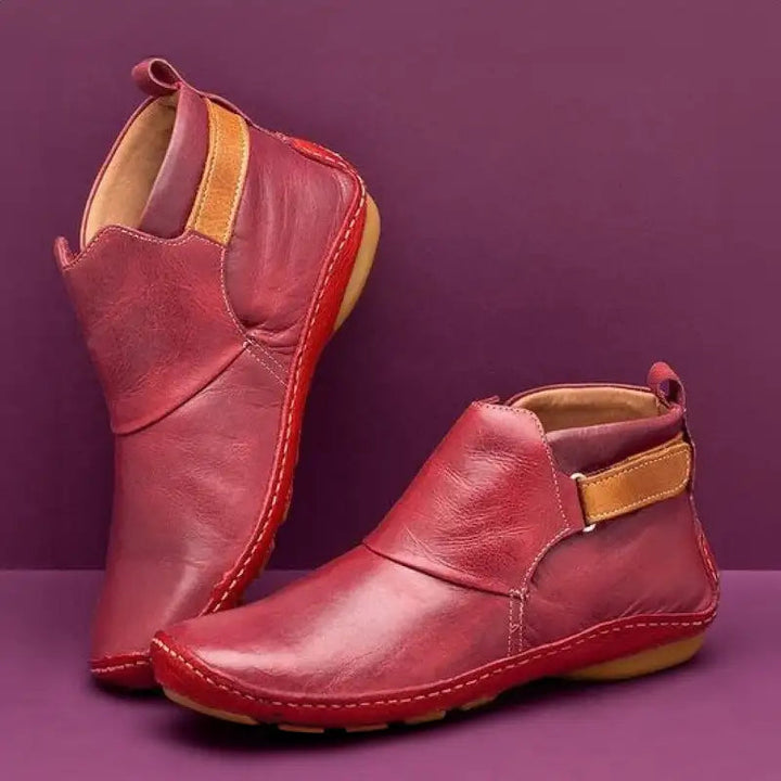 Eleganti stivaletti donna con cinturino laterale regolabile e suola flessibile, perfetti per il tuo stile autunnale.