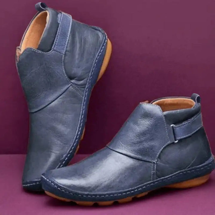 Cammina con comfort: stivaletti donna flessibili con cinturino laterale, calzature comode per la moda invernale.