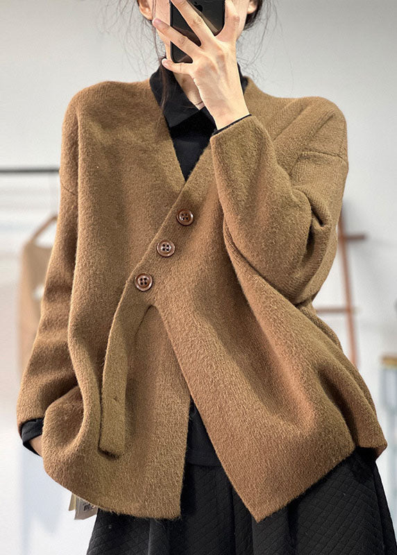 Maglione donna asimmetrico elegante, caldo e moderno, ideale per l'inverno. Design comodo con maniche lunghe.