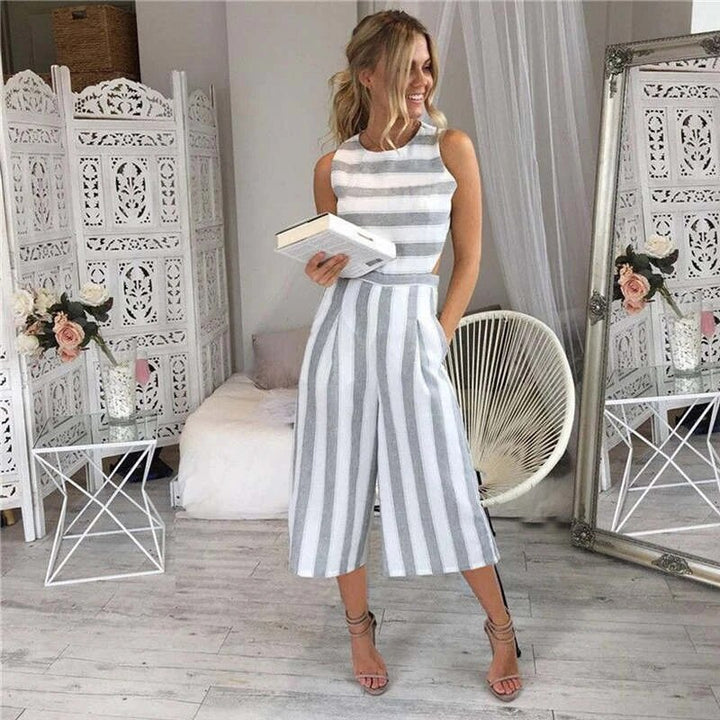 Tuta lunga donna a righe elegante e comoda, perfetta per l'estate e la moda primavera. Senza maniche.
