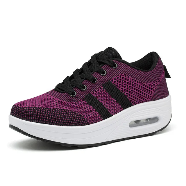 Scarpe donna sportive con supporto plantare e ammortizzazione superiore per comfort ottimale.