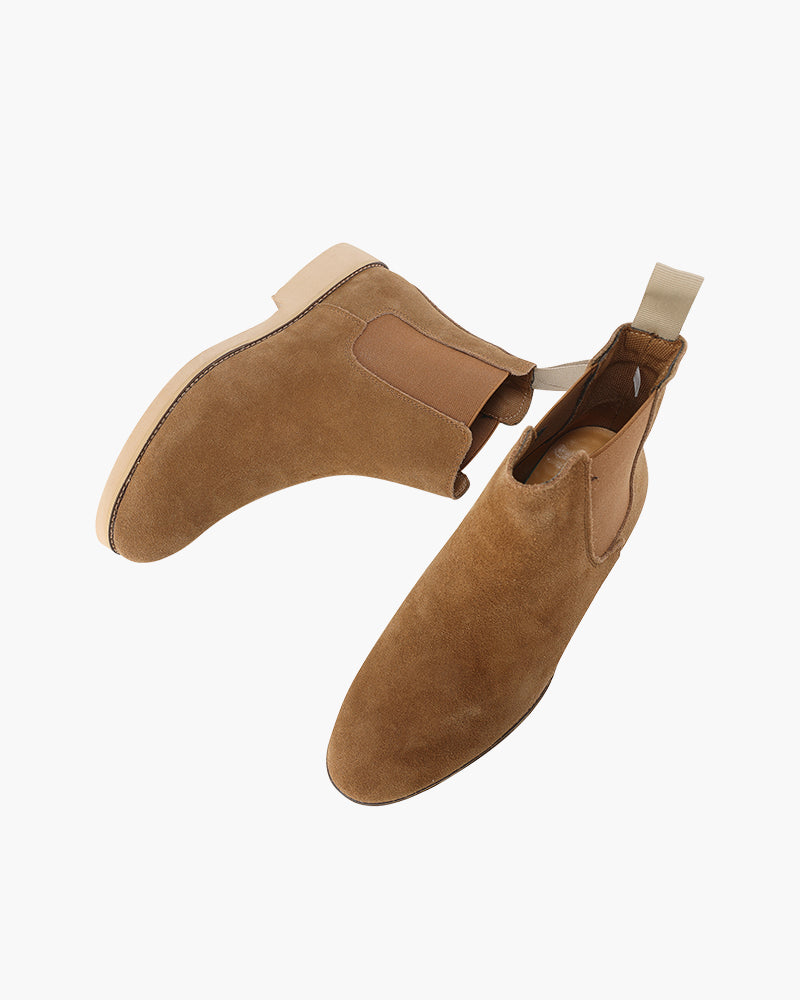 Chelsea boots verdi, stivaletti uomo distintivi per un outfit casual chic e alla moda.
