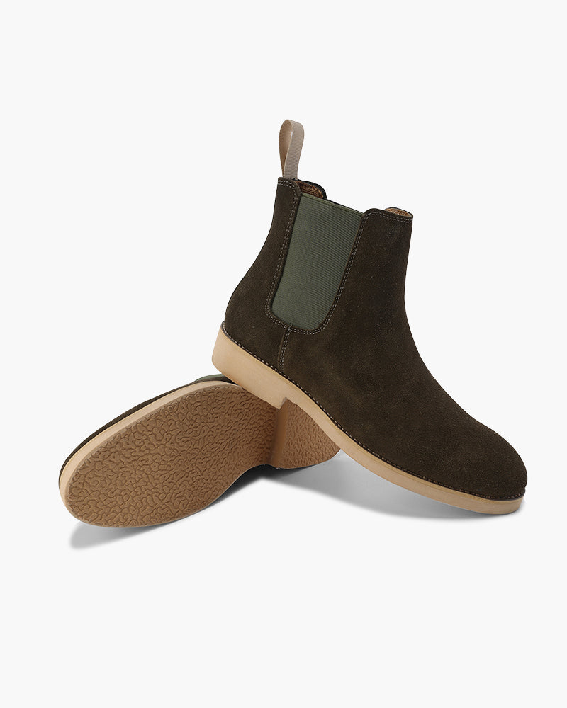 Stivali Chelsea marroni per uomo, calzature eleganti e robuste, ideali per l'autunno.