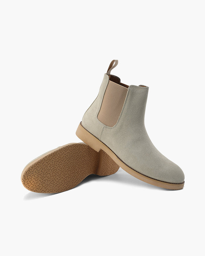 Stivaletti uomo eleganti marroni, design slip-on per un look sofisticato e pratico.