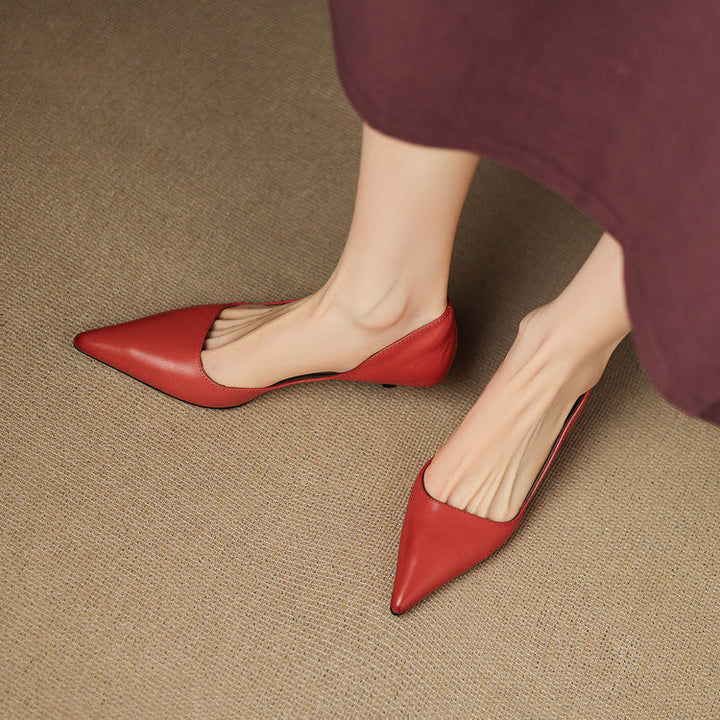 Tacchi da ufficio neri décolleté. Scarpe donna eleganti e confortevoli, perfette per lunghe giornate.