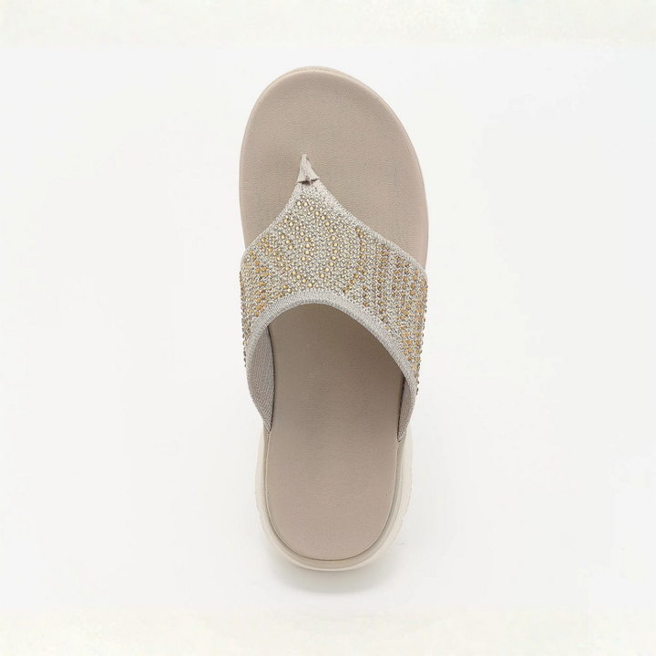 Sandali infradito da donna comodi e stilosi, con dettagli crystal per un'estate confortevole.