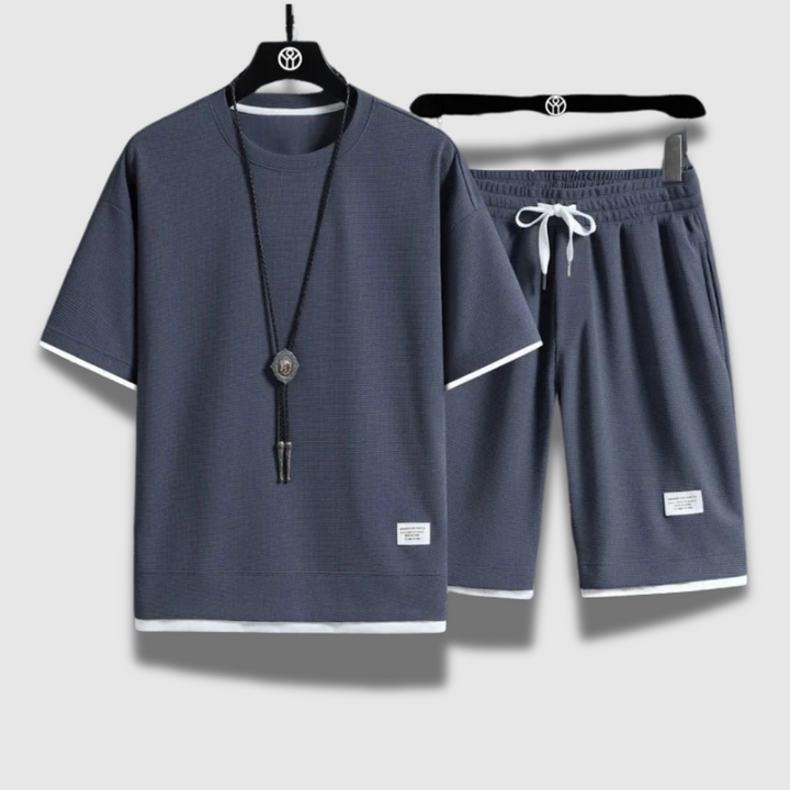 Set estivo casual uomo: camicia e pantaloncini traspiranti per massimo comfort e relax.