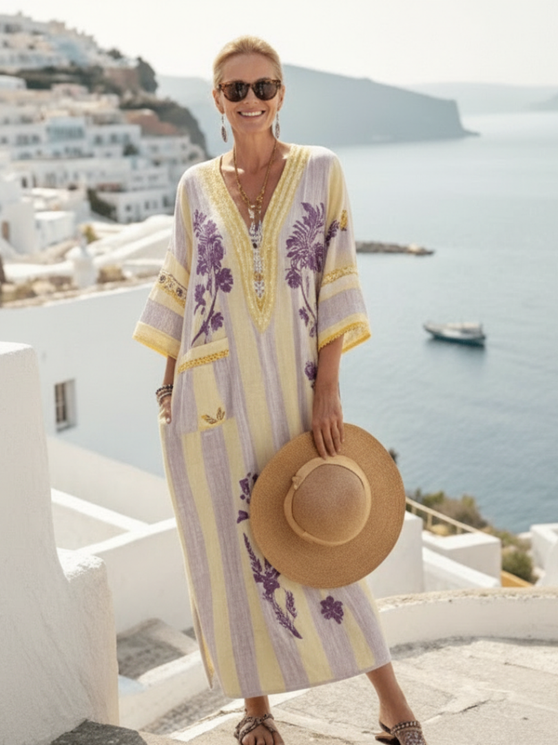 Abito donna floreale beige con scollo a V profondo e mezze maniche, ideale per l'estate e look raffinati.