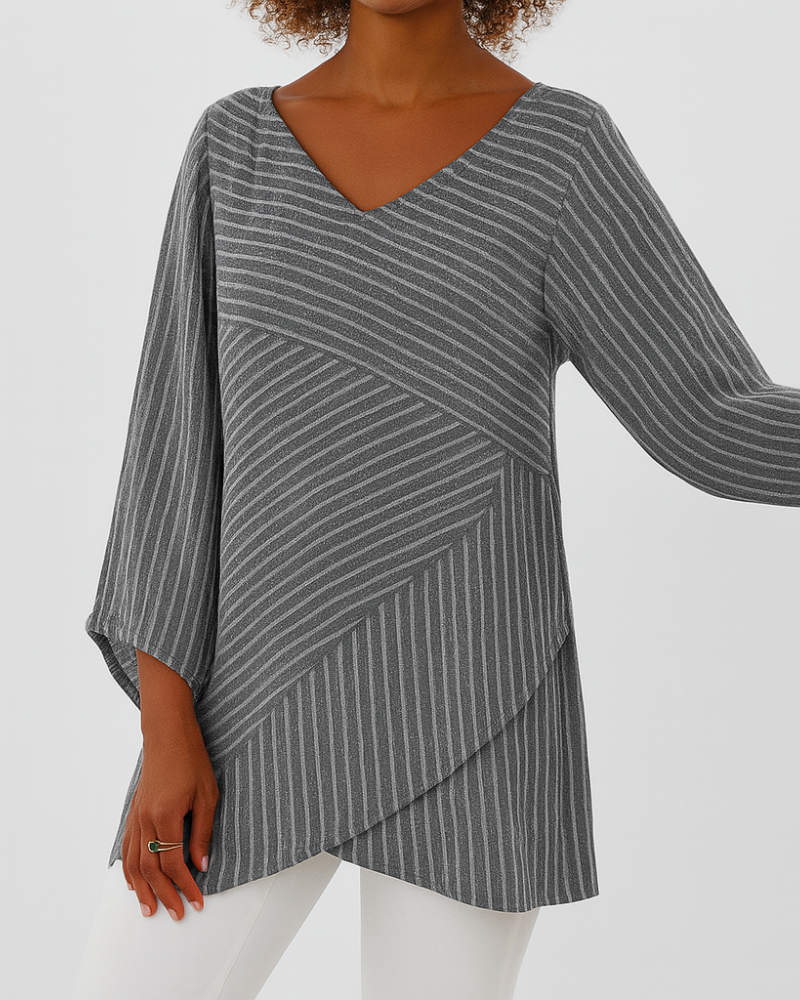Blouse donna asimmetrica con design a righe diagonali stratificate, maniche a pipistrello. Ideale per moda donna.
