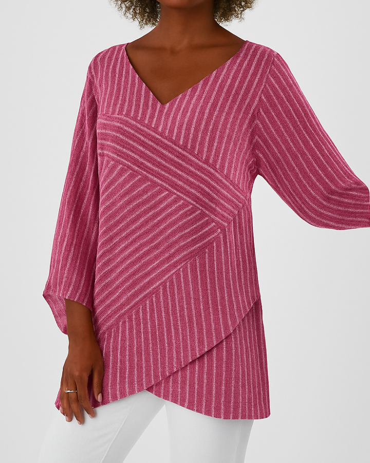 Top donna chic con righe diagonali sfumate e maniche ampie a pipistrello, stile moderno. Ottimo per uscite serali.