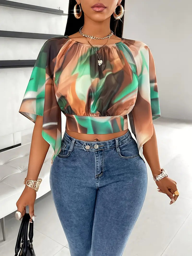 Sensuale top estivo donna crop batik verde, con design unico e maniche a volo. Abbigliamento moda femminile primavera.