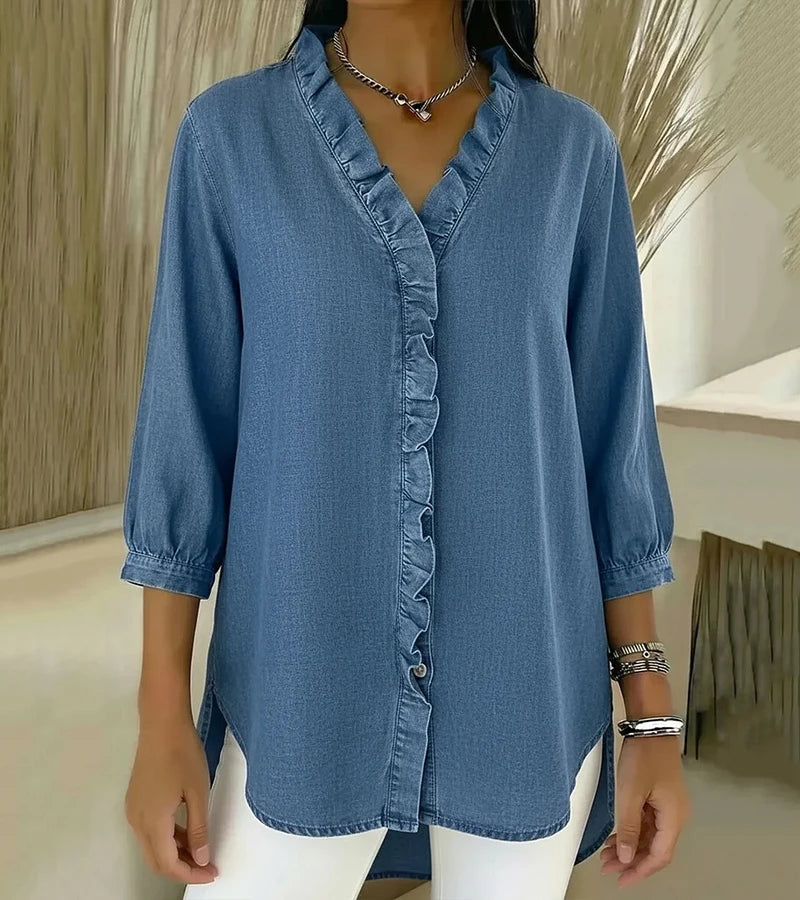 Blusa donna casual elegante con scollo a V e ruches sul davanti. Maniche a tre quarti.