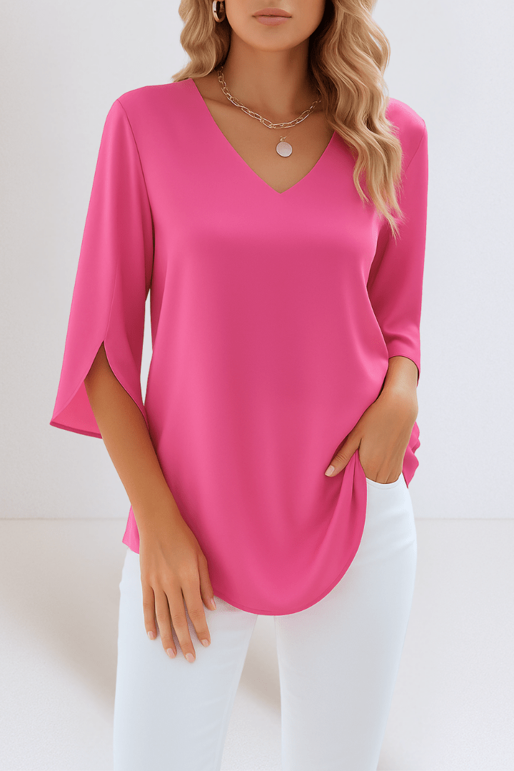 Top donna morbido a maniche lunghe, scollo a V, perfetto per outfit casual o serate eleganti. Abbigliamento donna.