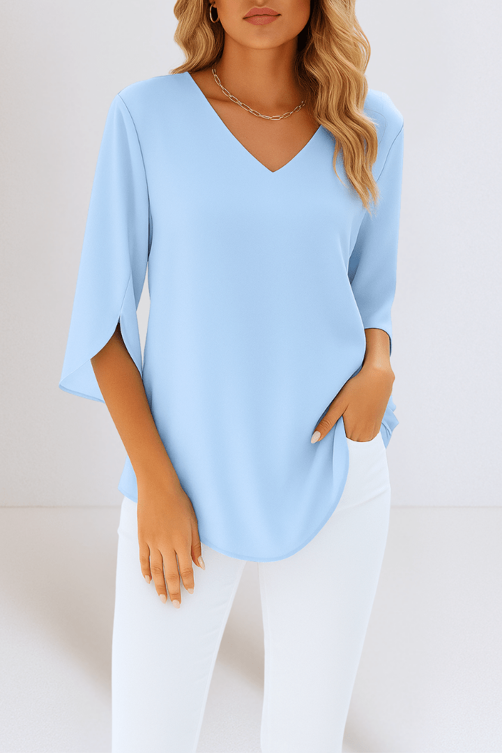 Top donna maniche lunghe con scollo a V, ideale per un look casual o elegante, vestibilità morbida.