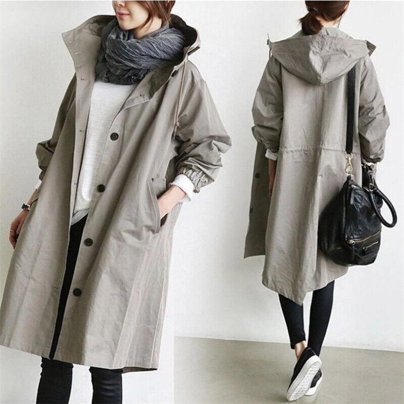 Trench donna oversize con cappuccio, un soprabito casual chic per la primavera e l'autunno. Eleganza e comfort.