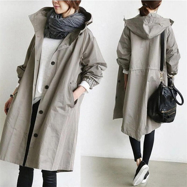 Trench donna oversize con cappuccio, un soprabito casual chic per la primavera e l'autunno. Eleganza e comfort.