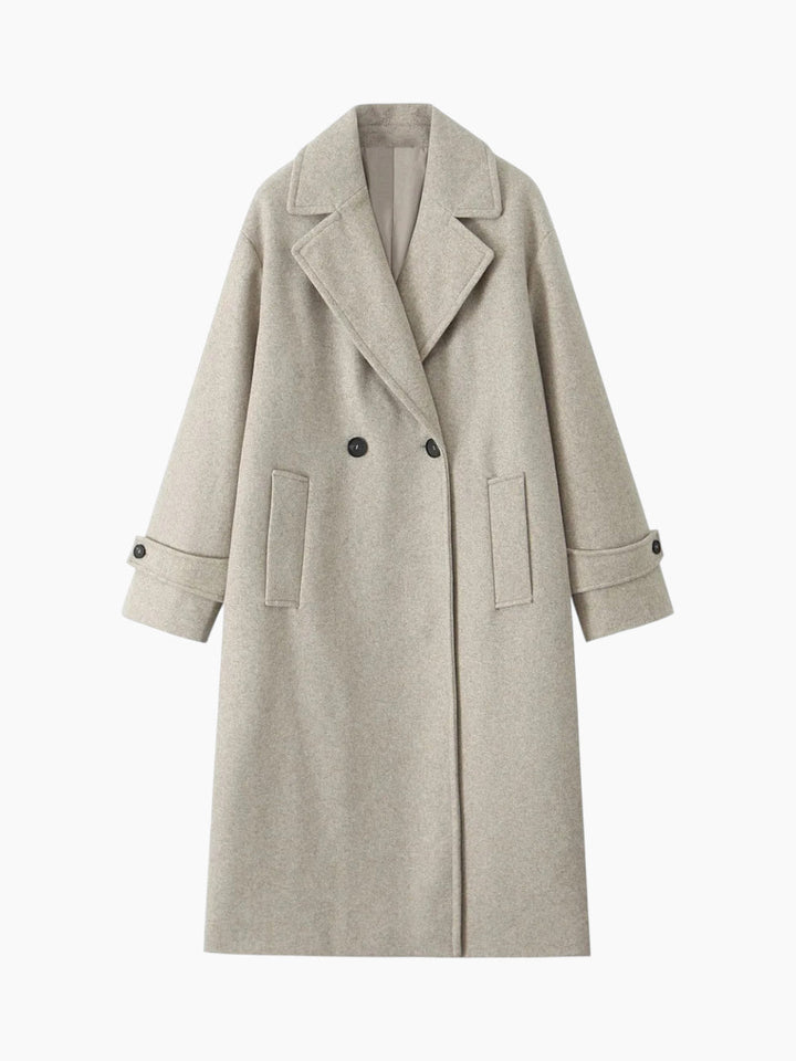 Trench donna classico, doppiopetto, un capospalla elegante e urbano per la moda femminile di mezza stagione.