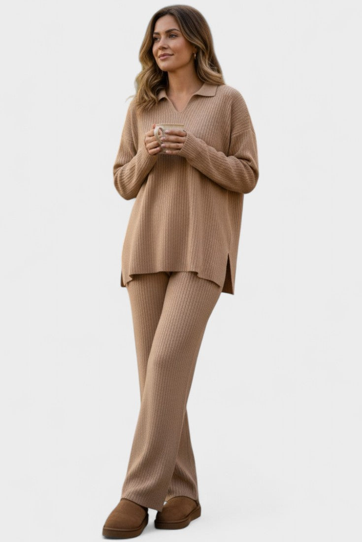 Outfit donna con maglia a collo polo e pantaloni larghi, stile comodo e versatile per ogni occasione.