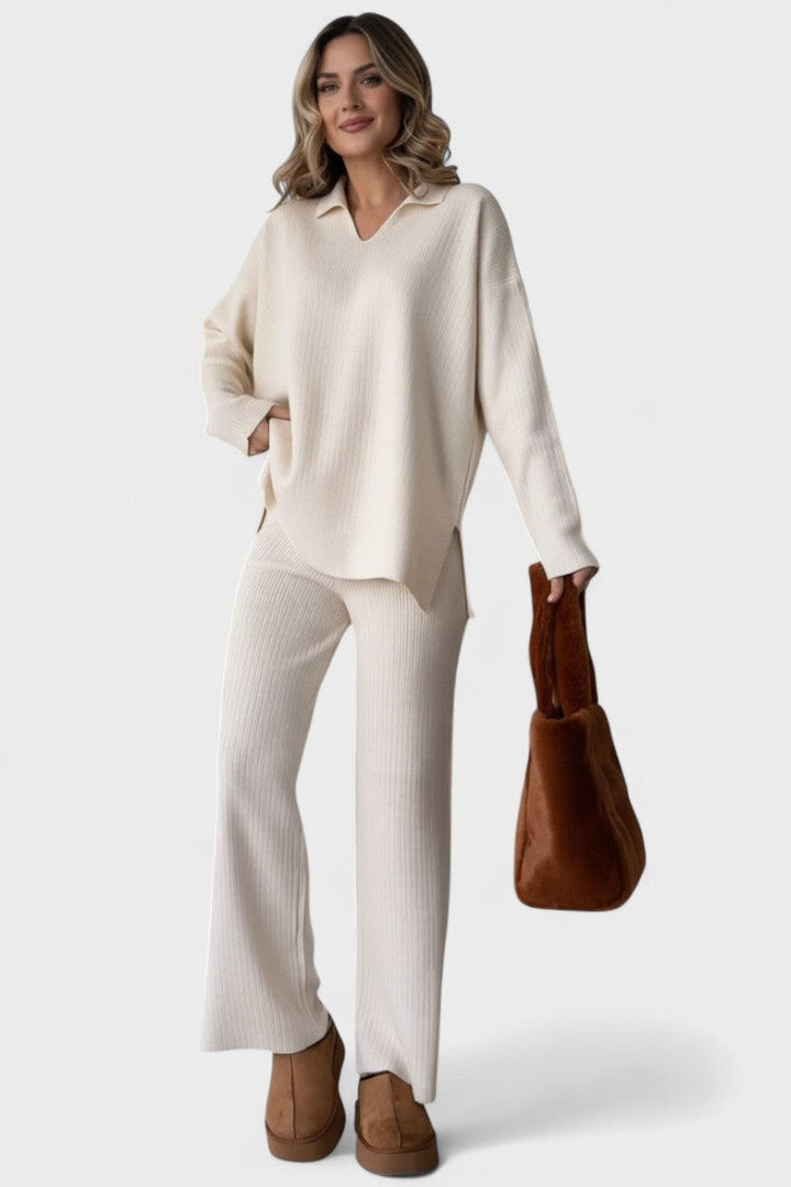 Completo donna elegante con maglia collo polo e pantaloni larghi, perfetto per stile casual e comodo.