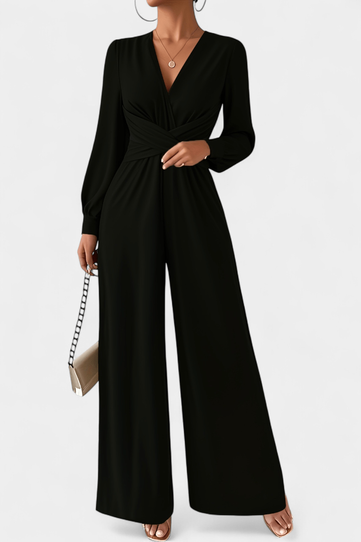 Tuta donna moda italiana: design elegante, scollo a V e vita drappeggiata con pantaloni ampi per un tocco chic.