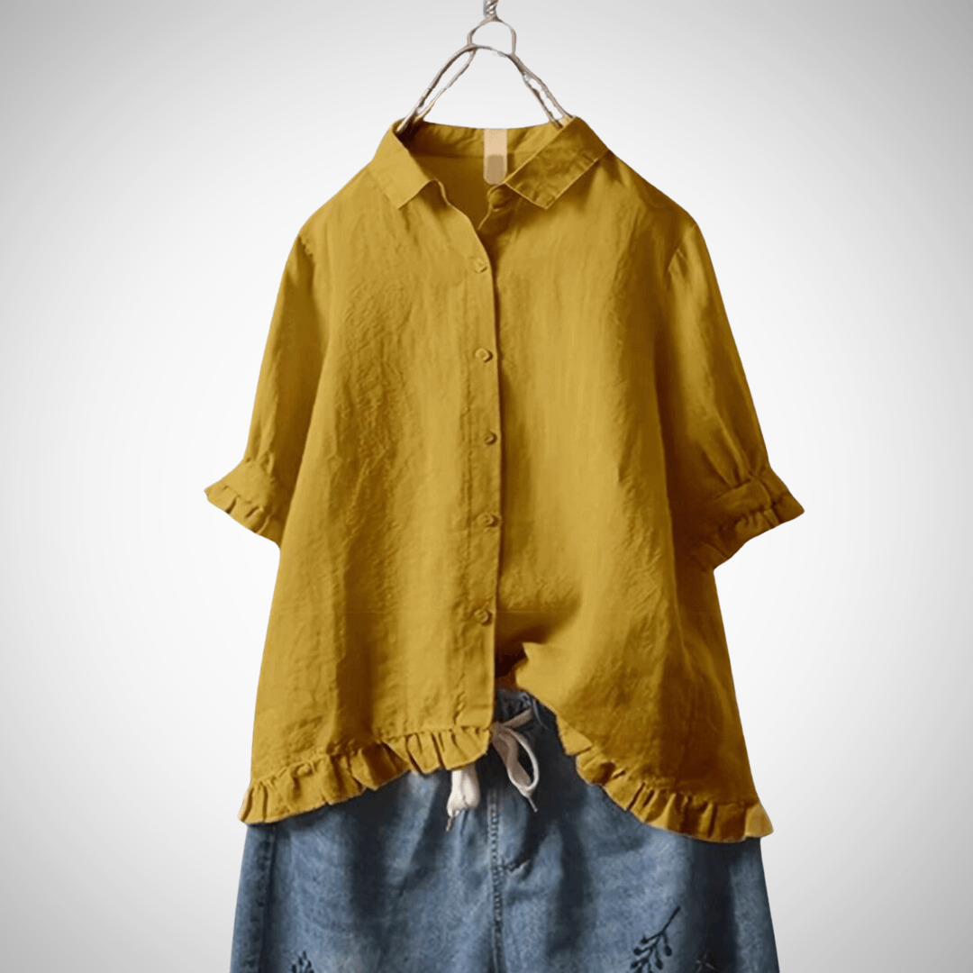 Camicia donna a maniche corte per l'estate. Realizzata in cotone, offre uno stile casual e una vestibilità comoda.
