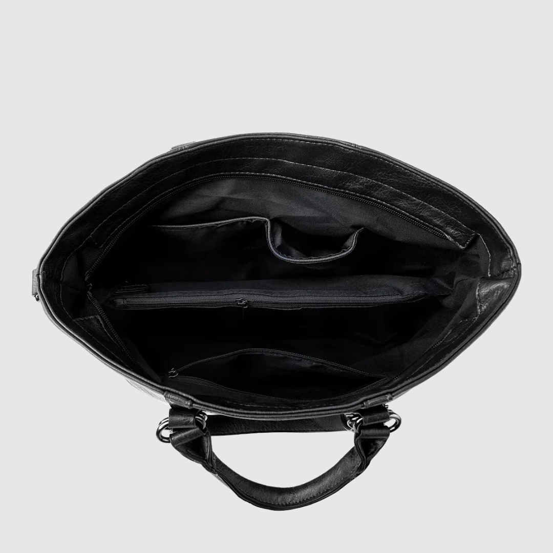Borsetta in pelle da donna, design moderno con tre cinghioli per diverse portabilità, chic e versatile.
