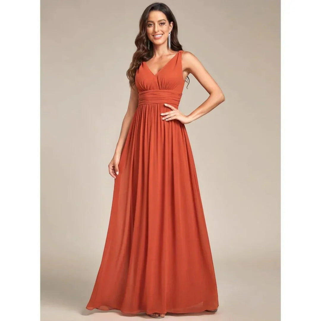 Abito donna elegante scollo a V, stile senza tempo, perfetto per primavera ed estate.