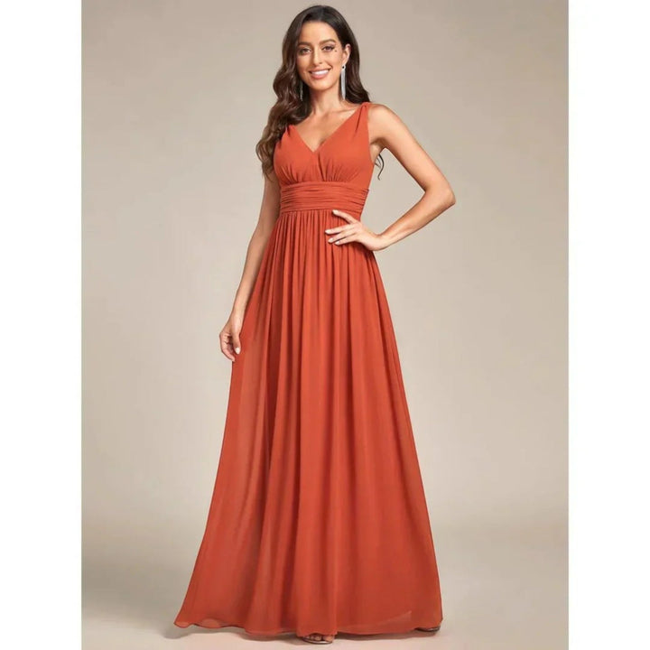 Abito donna elegante scollo a V, stile senza tempo, perfetto per primavera ed estate.