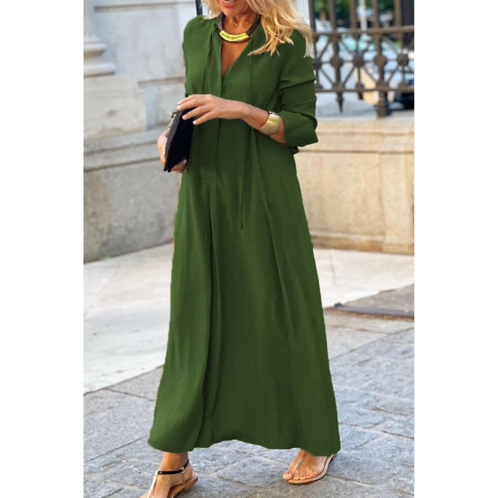 Maxi abito donna chic con scollo a V profondo e maniche lunghe. Ideale per un look sofisticato e alla moda.