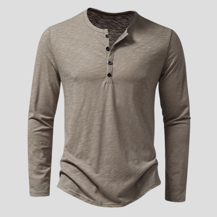 Camicia Henley uomo in cotone a maniche lunghe, chiusura a bottoni, ideale per un look versatile.