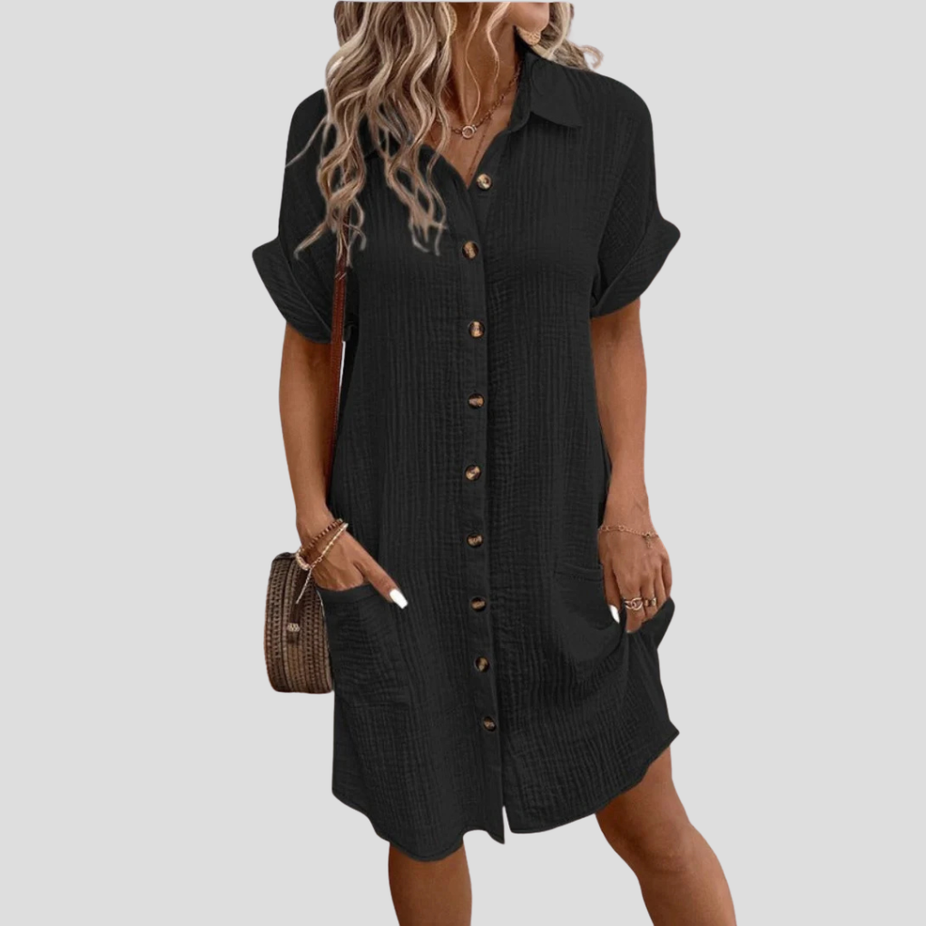 Vestito a camicia da donna versatile per primavera ed estate, con bottoni frontali e pratiche tasche laterali.