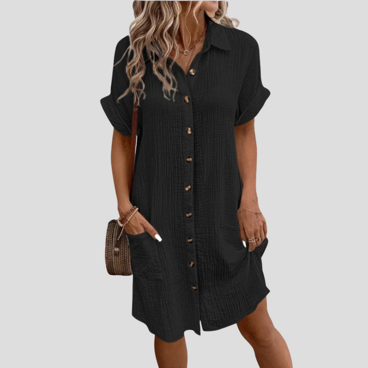 Vestito a camicia da donna versatile per primavera ed estate, con bottoni frontali e pratiche tasche laterali.