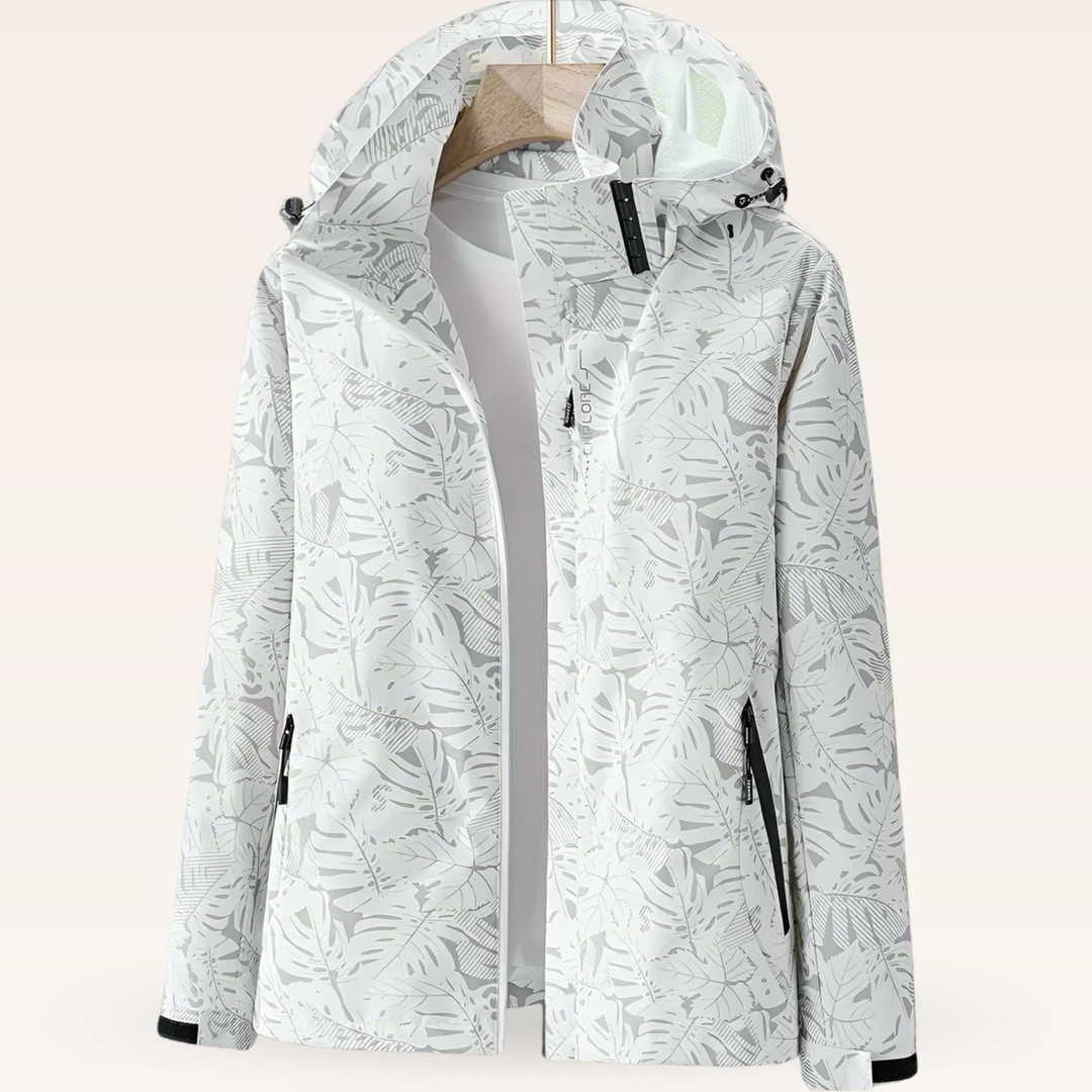 Giacca impermeabile donna primaverile con stampa a foglie e cappuccio, ideale per il tempo libero e la pioggia.