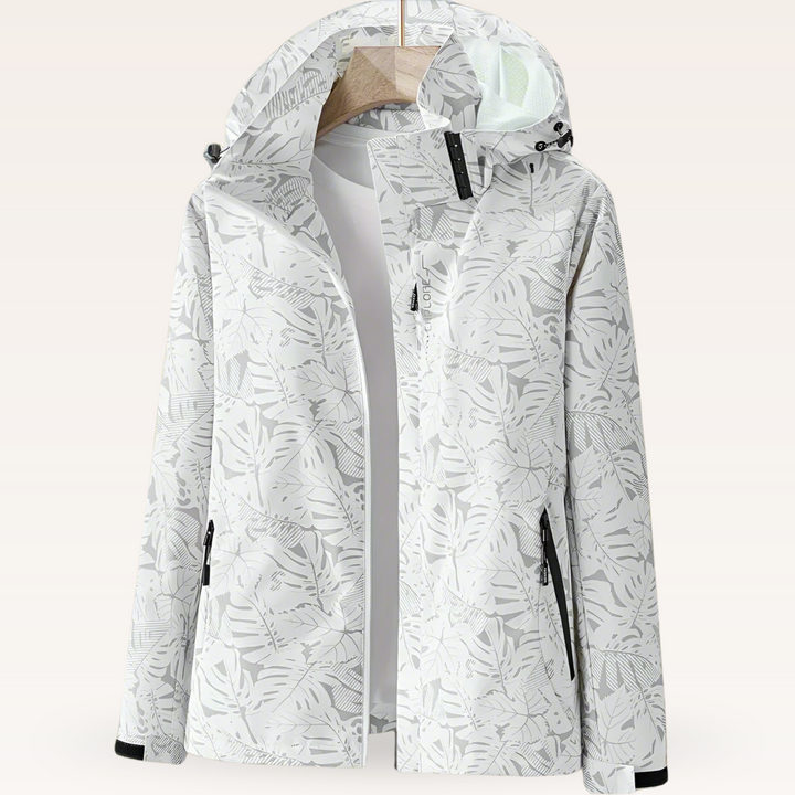 Giacca impermeabile donna primaverile con stampa a foglie e cappuccio, ideale per il tempo libero e la pioggia.