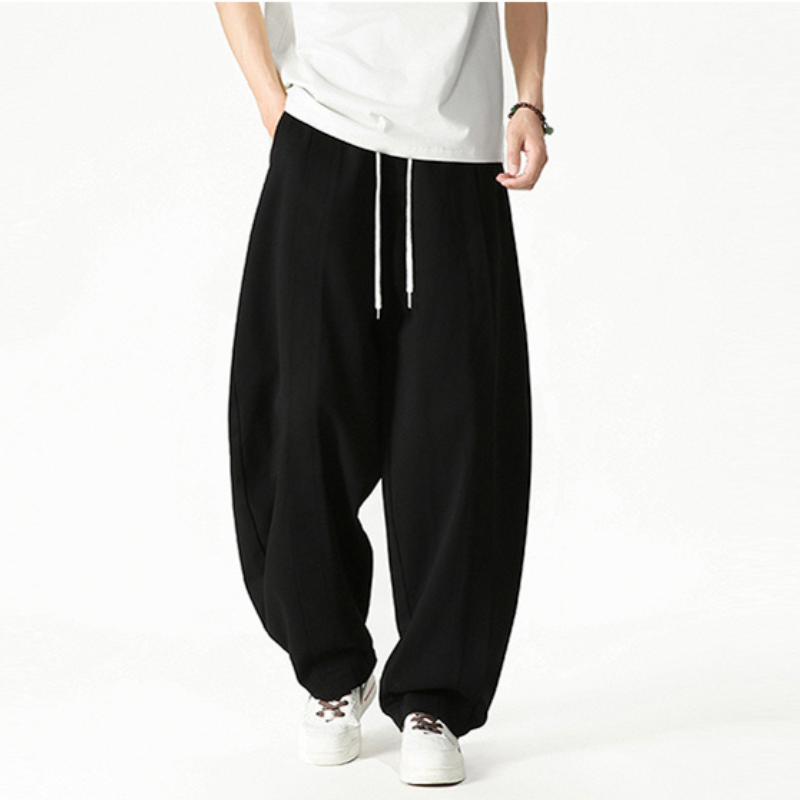Pantaloni casual uomo a gamba larga, con coulisse in vita, perfetti per il tempo libero e il massimo comfort.