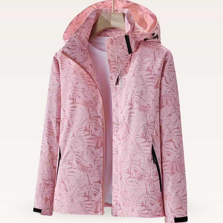 Giacca outdoor donna con stampa a foglie, leggera e impermeabile, dotata di cappuccio per protezione dal vento.