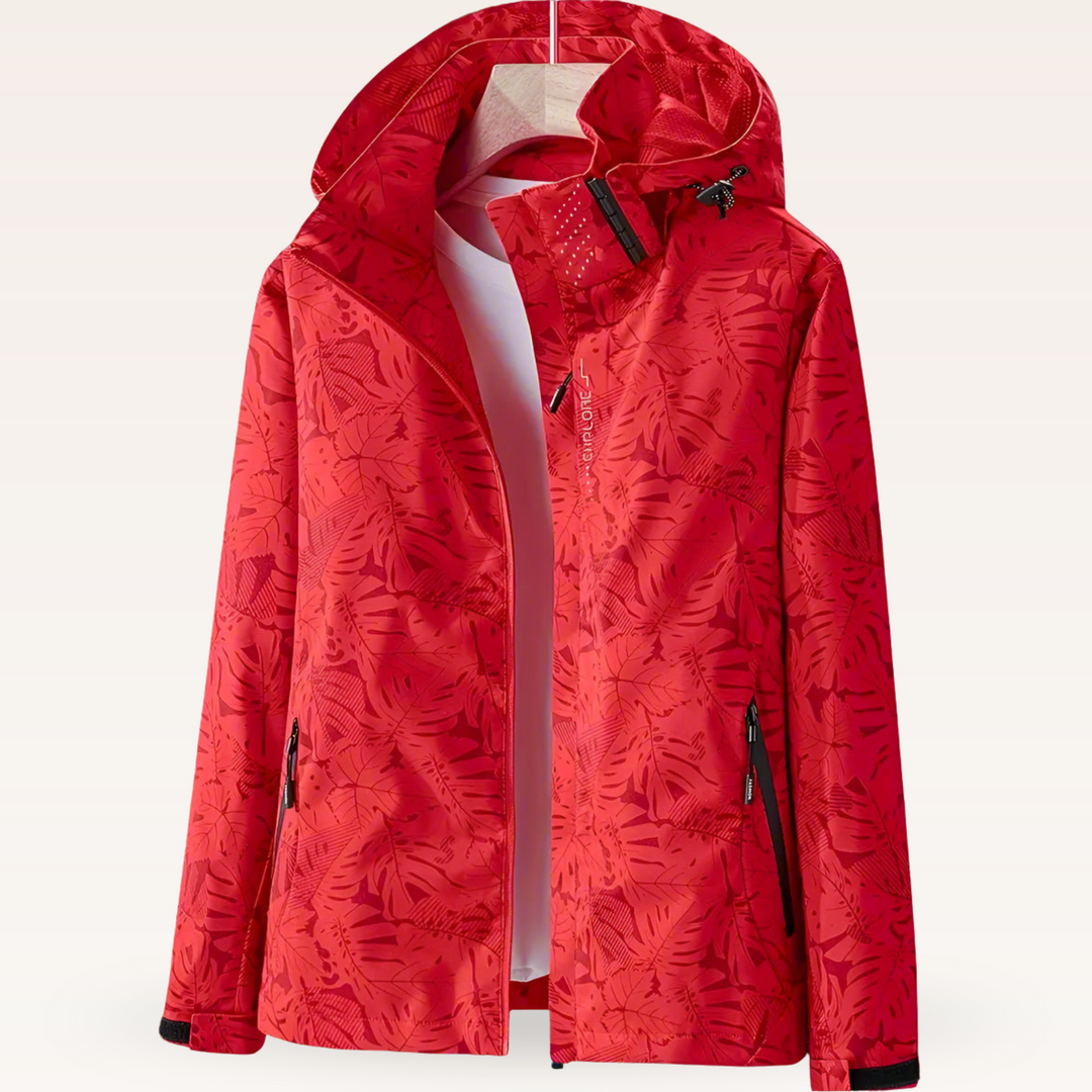 Giacca moda donna impermeabile primaverile con elegante stampa a foglie, versatile per look casual e chic.