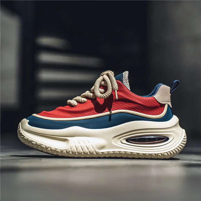 Sneakers uomo retrò con suola spessa, ideali per comfort urbano e stile casual quotidiano.
