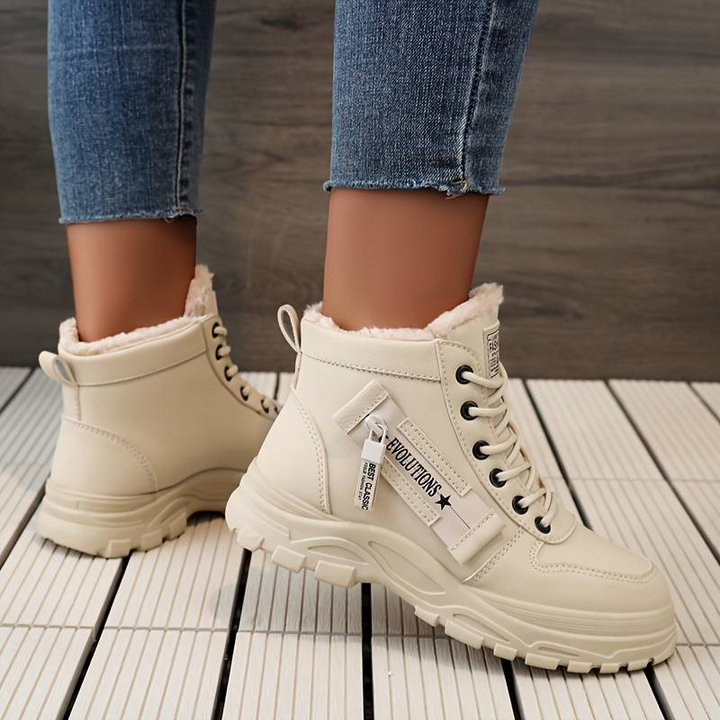 Stivaletti donna neri con lacci, caldi e confortevoli, perfetti per l'inverno. Calzature eleganti e pratiche.