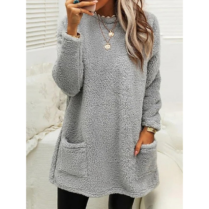 Morbido maglione teddy oversize da donna, comodo e accogliente con tasche, ideale per l'inverno.
