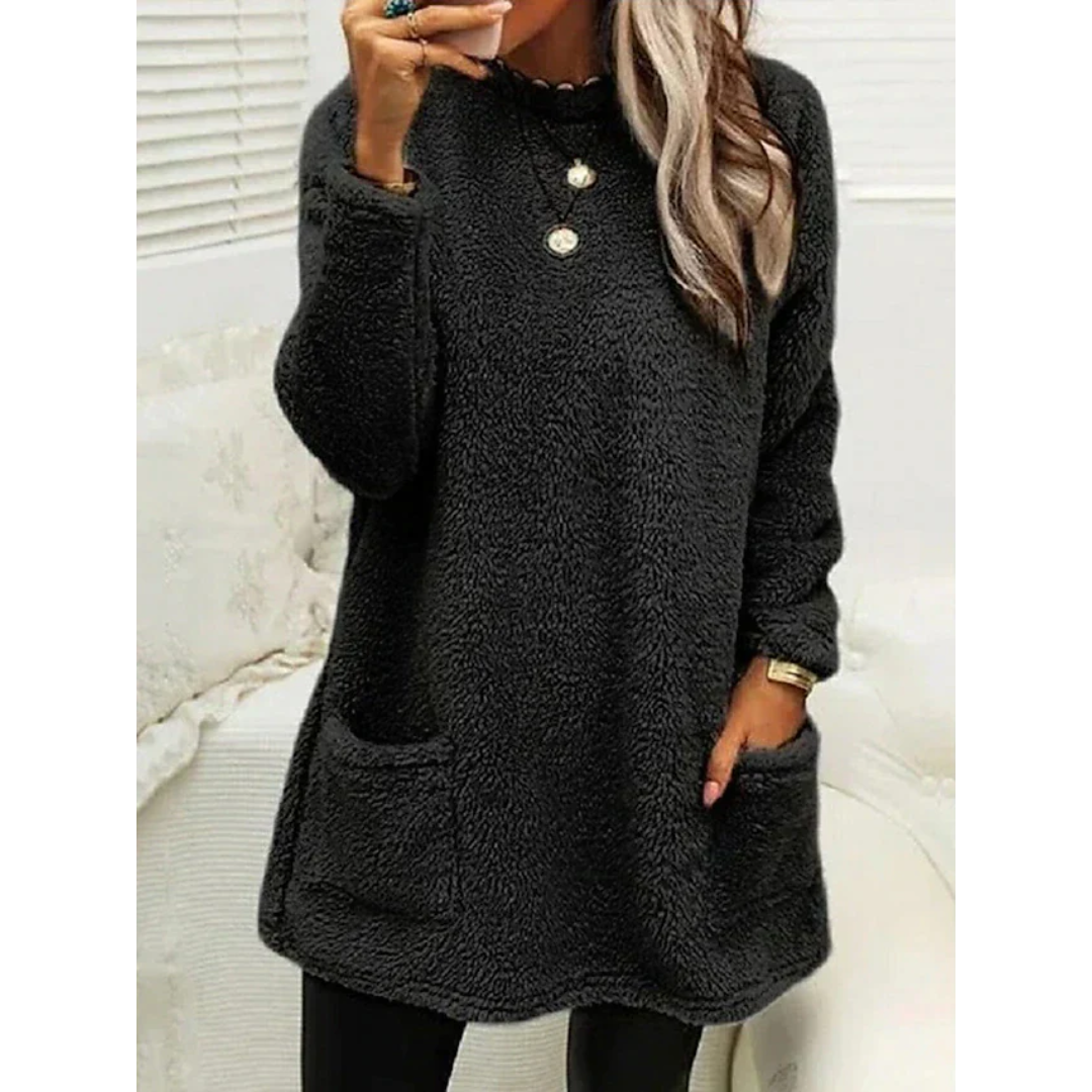 Maglione oversize teddy da donna accogliente con tasche, perfetto per outfit casual autunno/inverno.