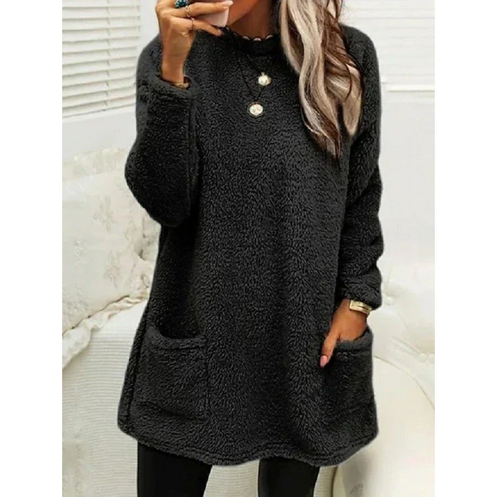 Maglione oversize teddy da donna accogliente con tasche, perfetto per outfit casual autunno/inverno.